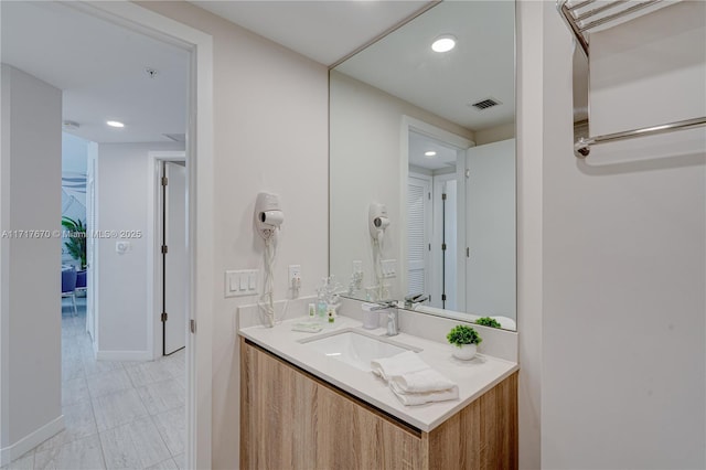 bathroom featuring vanity