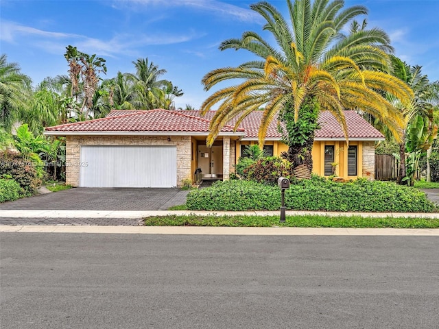 view of front of property with a garage