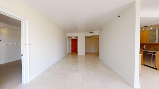 hallway featuring sink