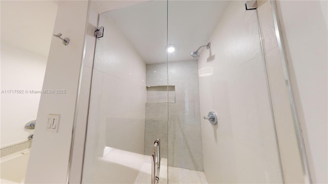 bathroom with an enclosed shower