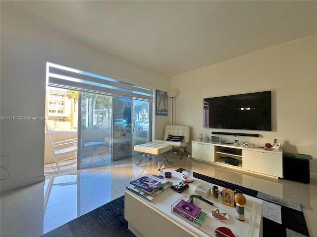 living room with tile patterned flooring