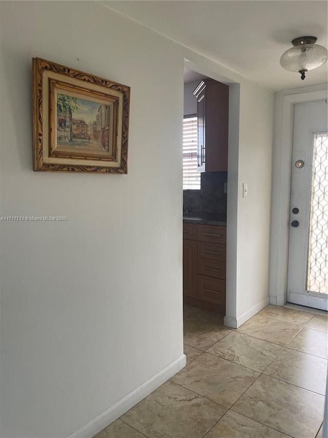 8345 Sunrise Lakes Blvd Unit 309, Sunrise, FL 33322 - entrance foyer featuring baseboards