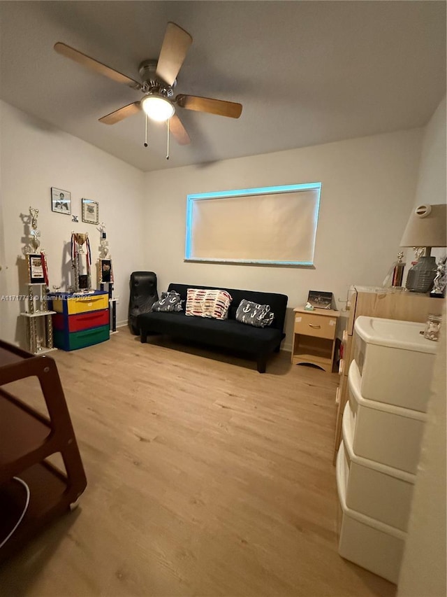 8345 Sunrise Lakes Blvd Unit 309, Sunrise, FL 33322 - living area with washer / clothes dryer, wood finished floors, and a ceiling fan