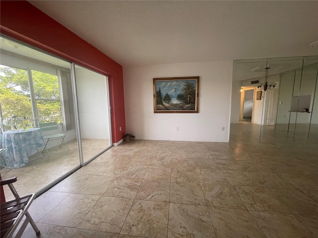 8345 Sunrise Lakes Blvd Unit 309, Sunrise, FL 33322 - interior space with baseboards and a textured ceiling