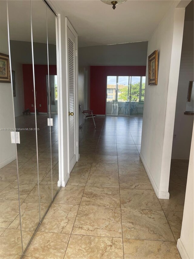 8345 Sunrise Lakes Blvd Unit 309, Sunrise, FL 33322 - corridor with baseboards
