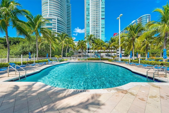 view of swimming pool with a patio area