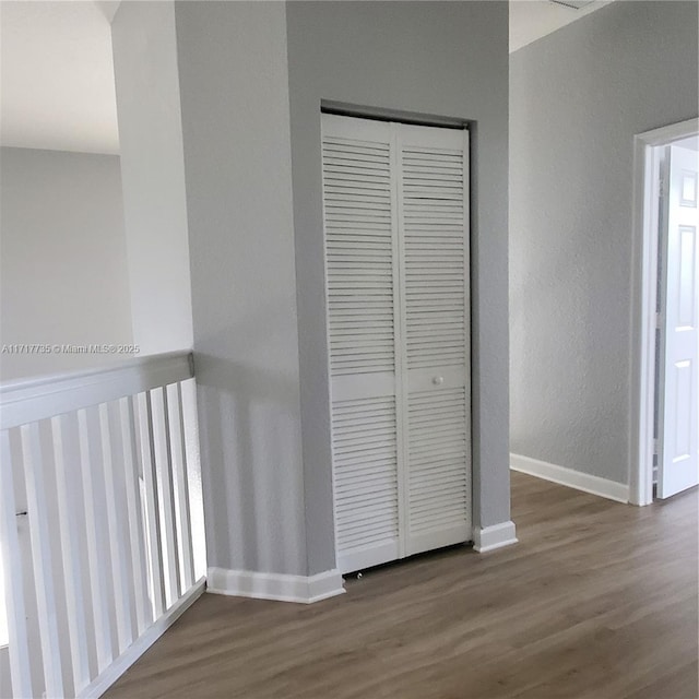 hallway featuring hardwood / wood-style floors