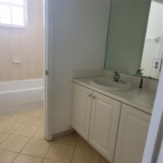 bathroom featuring tile patterned floors, vanity, and shower / bath combination