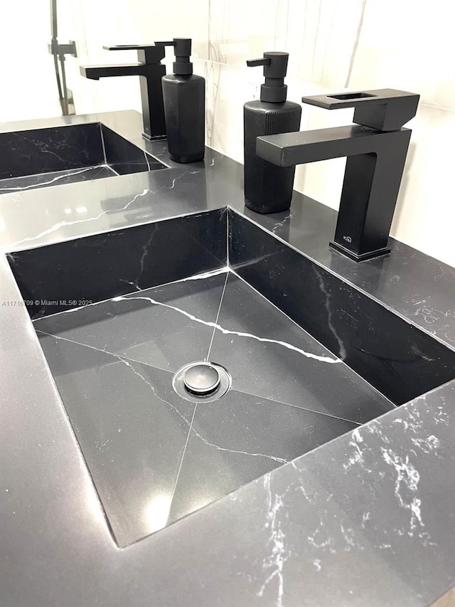 10230 Collins Ave Unit 102, Bal Harbour, FL 33154 - bathroom view of a sink