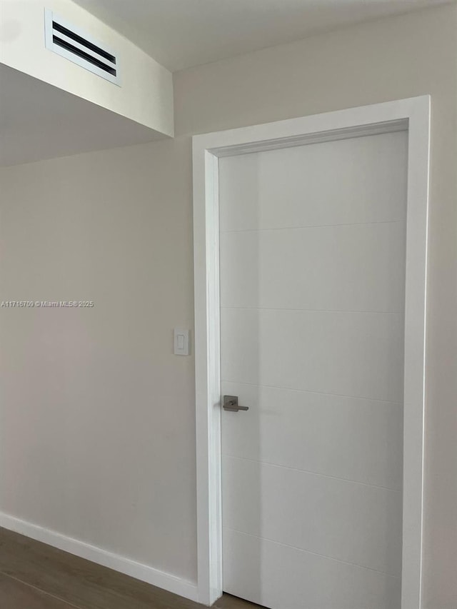 bathroom featuring hardwood / wood-style flooring