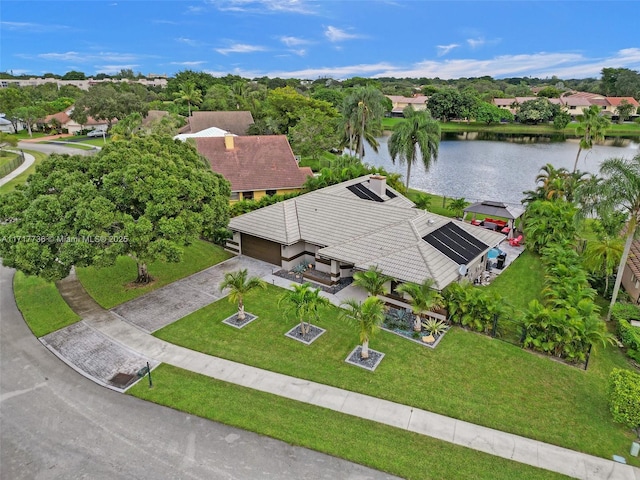 birds eye view of property featuring a water view