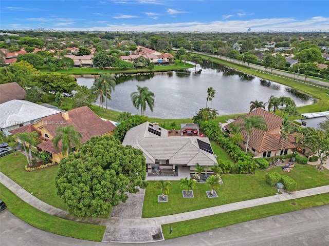 bird's eye view with a water view