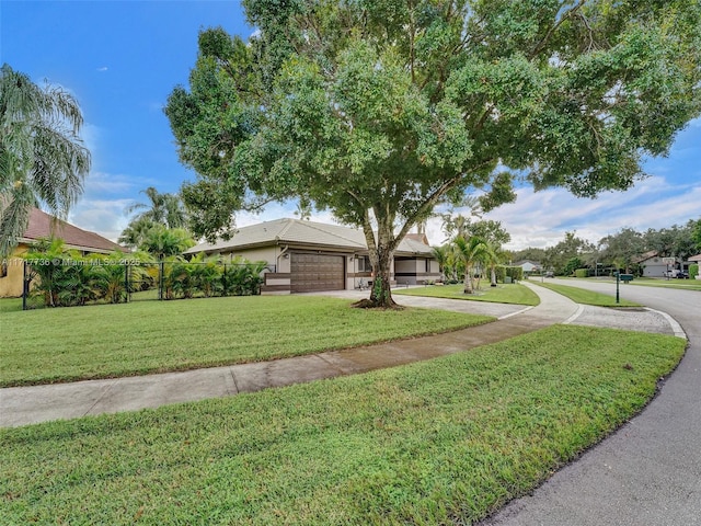 view of front of home with a front lawn