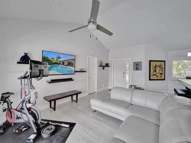 living room with ceiling fan and high vaulted ceiling