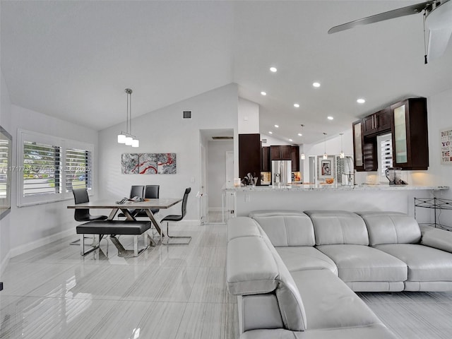 living room with vaulted ceiling