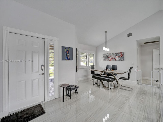 foyer with lofted ceiling