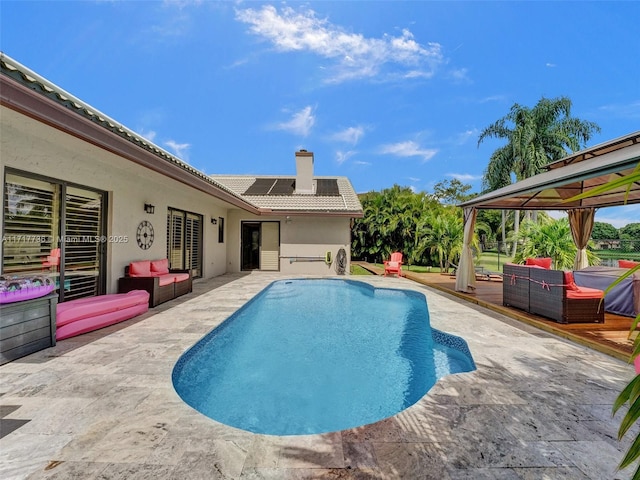 view of pool with a gazebo, a patio area, and an outdoor hangout area