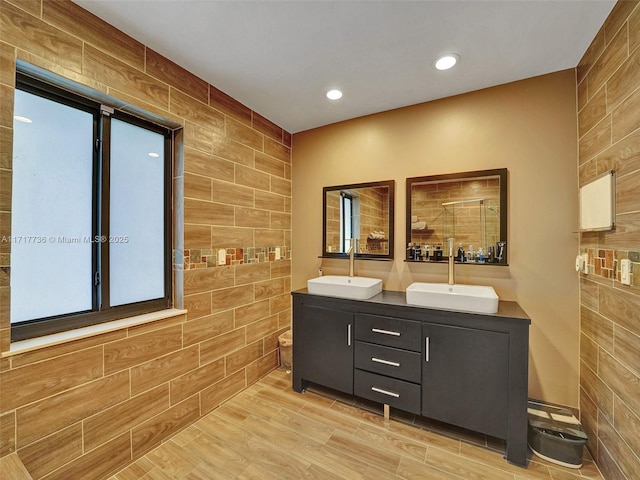 bathroom featuring vanity and walk in shower