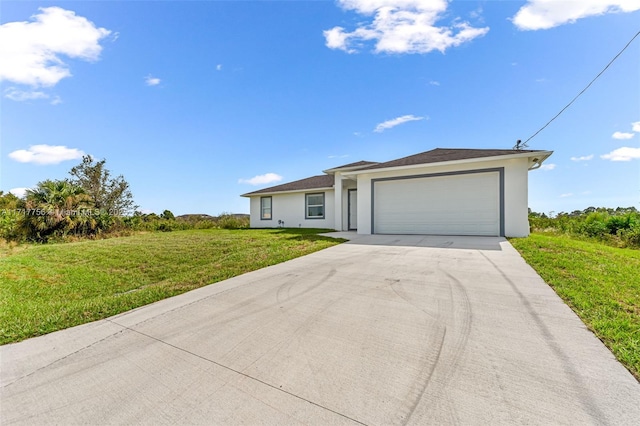 single story home featuring a front yard and a garage