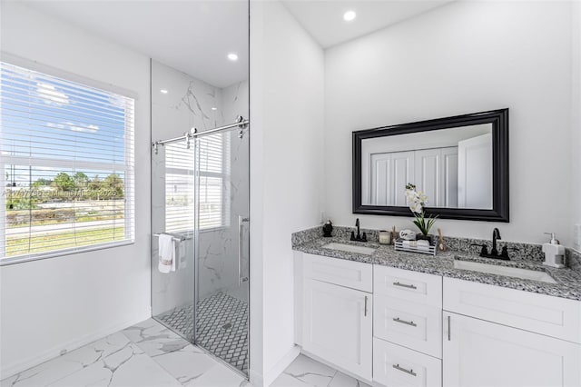 bathroom with vanity and an enclosed shower