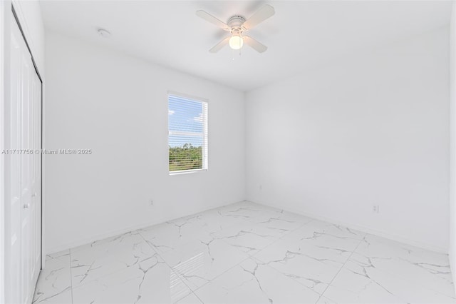 empty room featuring ceiling fan