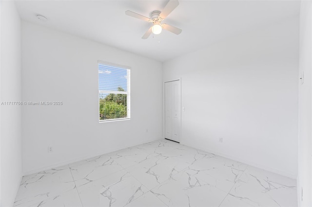 empty room featuring ceiling fan