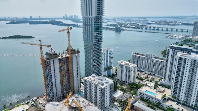 bird's eye view with a water view