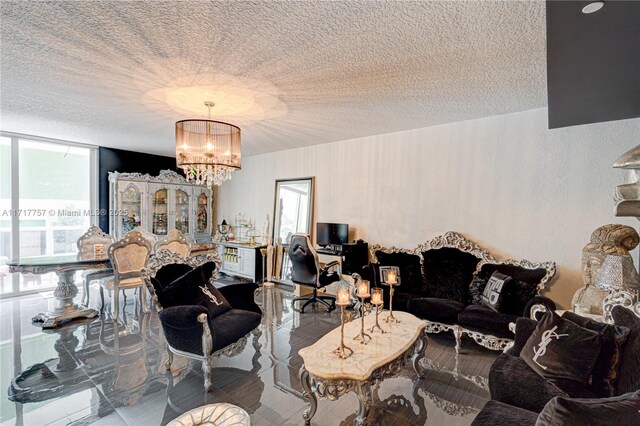 living room with floor to ceiling windows, a textured ceiling, a wealth of natural light, and a chandelier