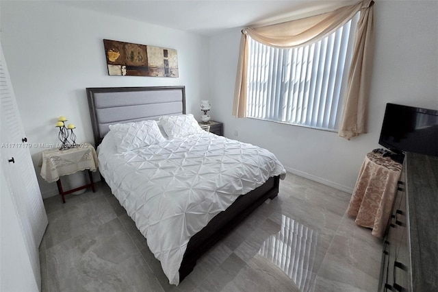 bedroom with tile patterned floors