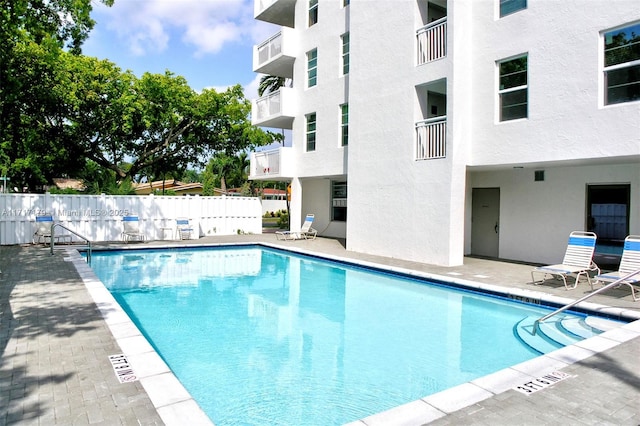 view of pool featuring a patio area