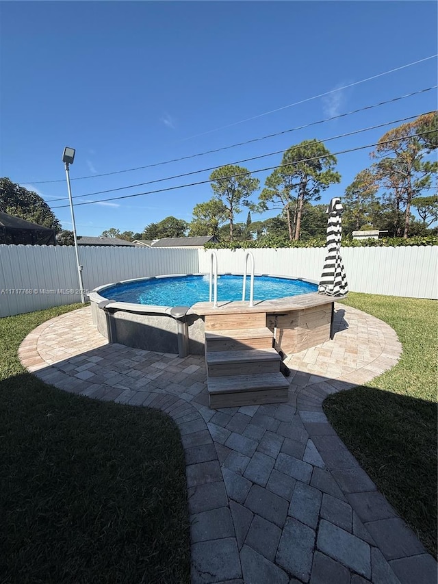 view of pool with a patio area