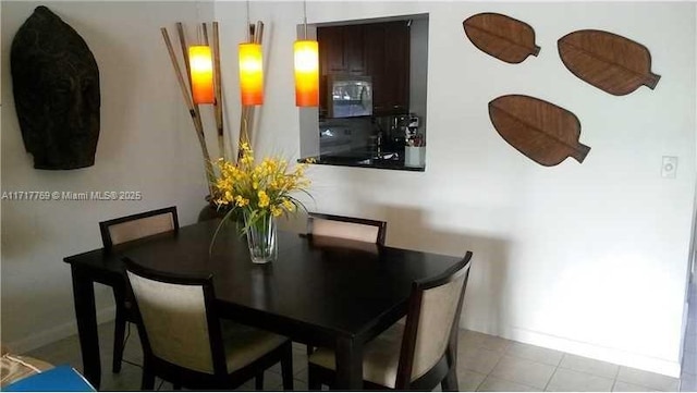 view of tiled dining area