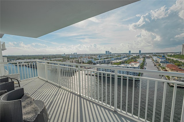 balcony featuring a water view