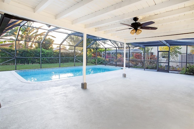 view of pool featuring ceiling fan, a lanai, and a patio