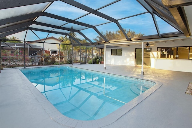 pool featuring a patio area, a lanai, and ceiling fan