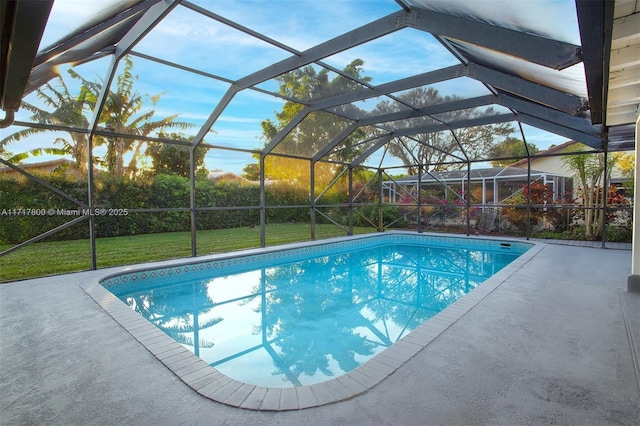 outdoor pool with a lanai, a yard, and a patio area