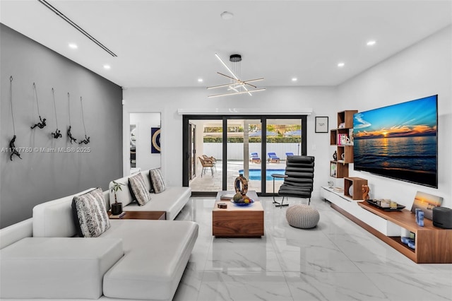 living room featuring a chandelier