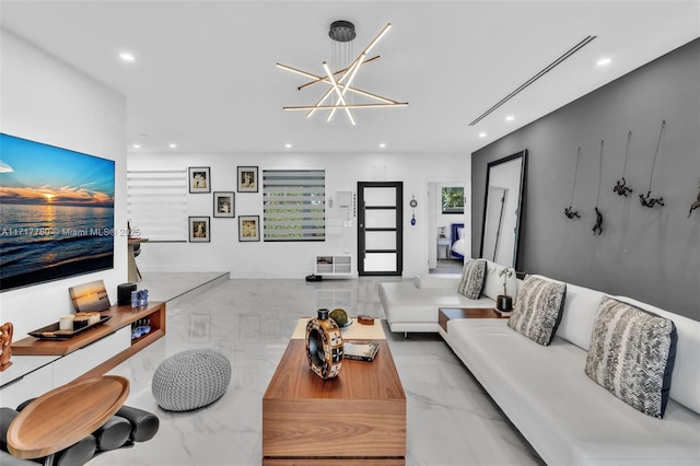 living room featuring a chandelier