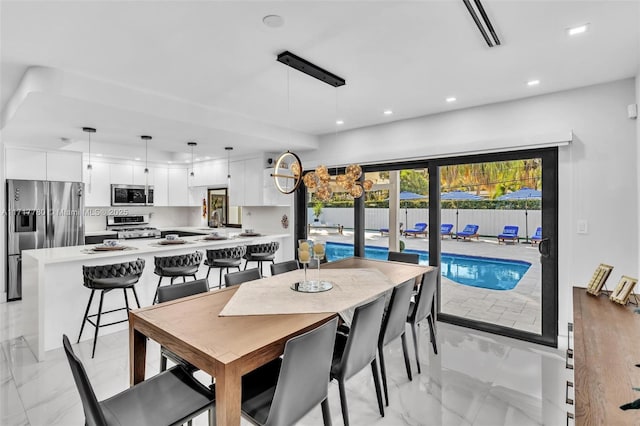 dining space featuring sink