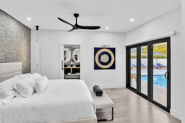 bedroom featuring ceiling fan, access to outside, and light hardwood / wood-style flooring