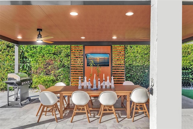 view of patio / terrace featuring a grill and ceiling fan