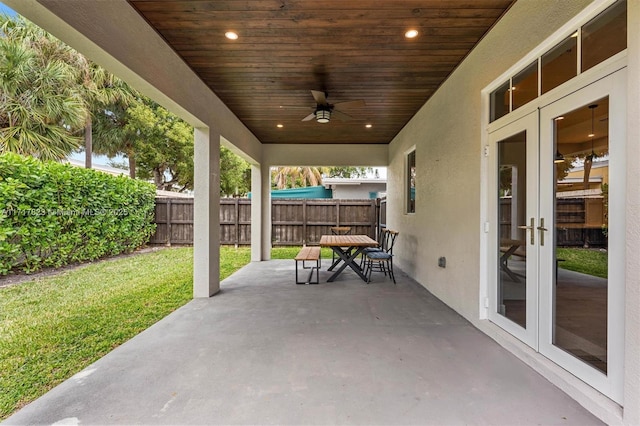 view of patio / terrace with ceiling fan and french doors