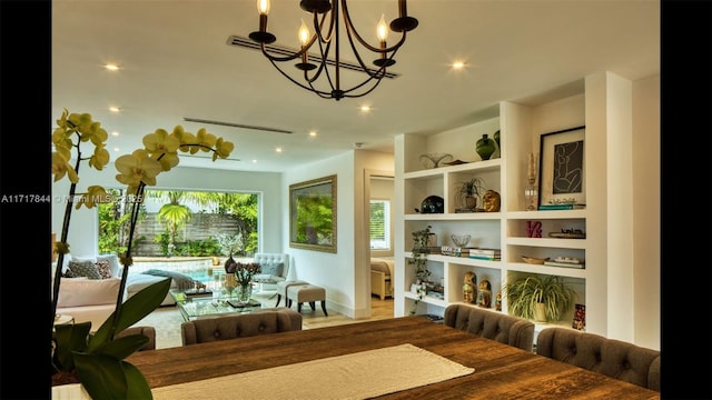 dining room with a chandelier