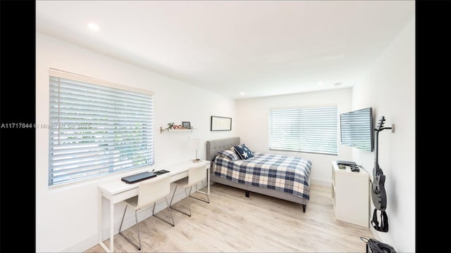 bedroom featuring light hardwood / wood-style floors