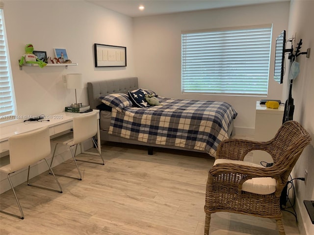 bedroom featuring light hardwood / wood-style flooring