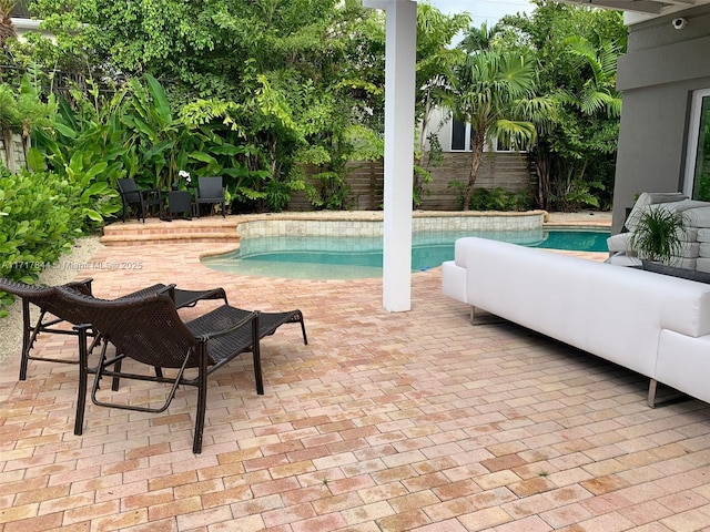 view of pool with a patio