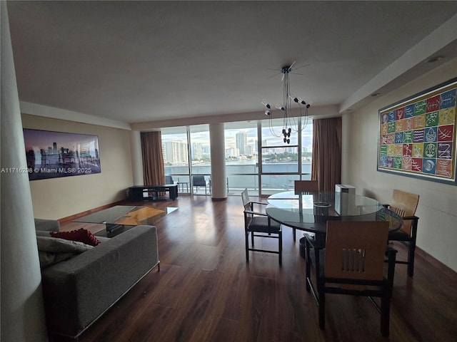 dining area with dark hardwood / wood-style floors