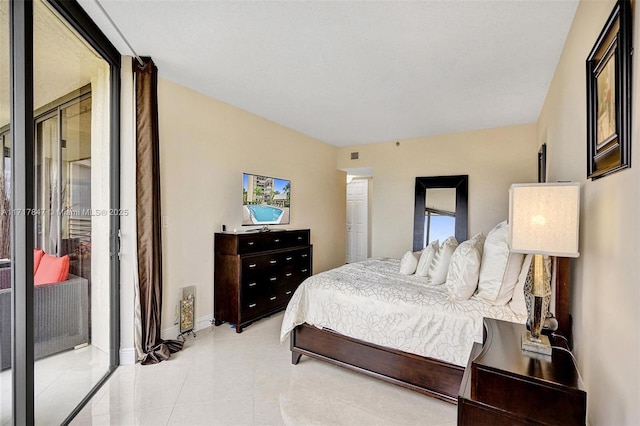 bedroom with light tile patterned flooring