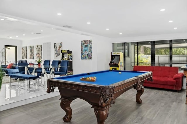 recreation room with light wood-type flooring and billiards