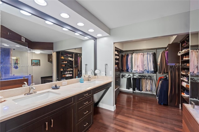 bathroom featuring vanity and hardwood / wood-style flooring